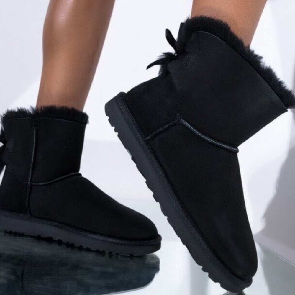 black boots with bow on back